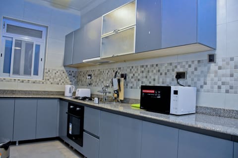 Family Apartment, 2 Bedrooms, Accessible, Hill View | Private kitchen | Fridge, microwave, stovetop, electric kettle