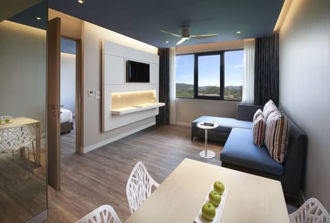 Suite, 1 Bedroom | Living area | Flat-screen TV