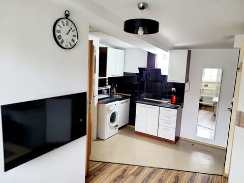 Apartment | Private kitchen | Fridge, microwave, stovetop, cookware/dishes/utensils