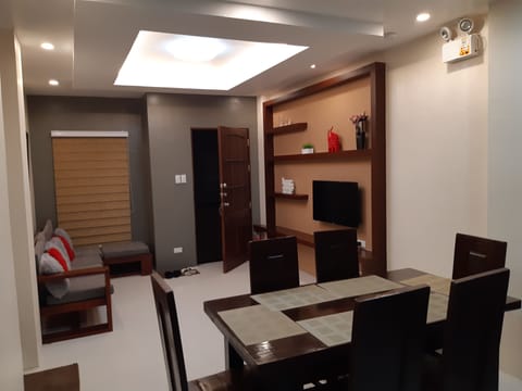 Duplex, 3 Bedrooms | Living area | Flat-screen TV