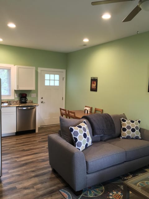 Great room with living room, dining area and kitchen.