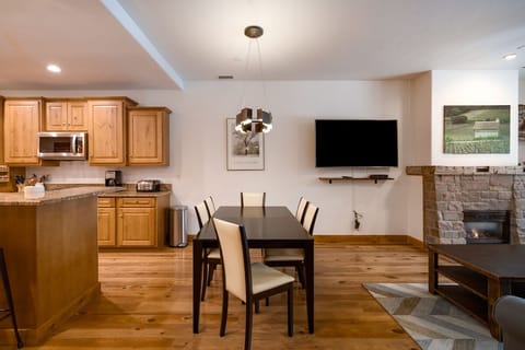 Seating for 6 around the dining room table with additional chairs to add if needed.