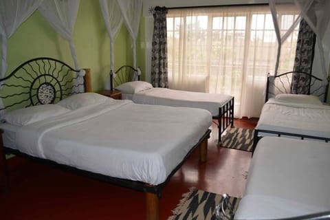 Quadruple Room, Multiple Beds, Private Bathroom | Premium bedding, desk, laptop workspace, iron/ironing board