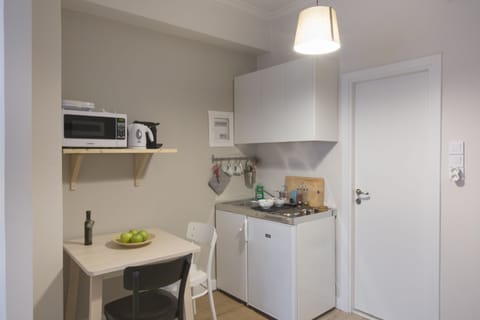 Apartment | Private kitchenette | Fridge, microwave, stovetop, dishwasher