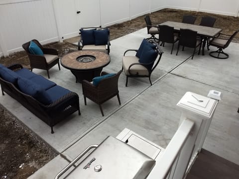 Large patio in fenced in yard with plenty of room to gather!