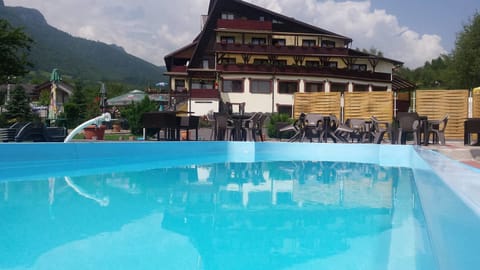 Seasonal outdoor pool, pool umbrellas, sun loungers