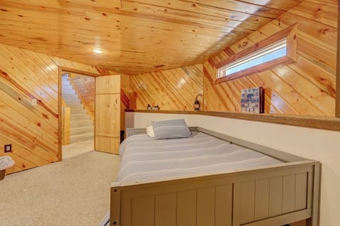 "Bear Room" in basement of Cabin #1.  2 full beds with twin trundle.