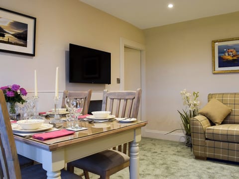 Relaxing living and dining room | The Lodge Cottage, Methven, near Perth
