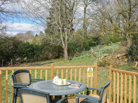 Lovely sunny sitting out area | Woodside Cottage, Ecclerigg, near Ambleside