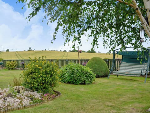 Shared use of the attractive garden at the front with open views over fields of corn towards the Angus Glens | Laurel Bank, Alyth, near Blairgowrie