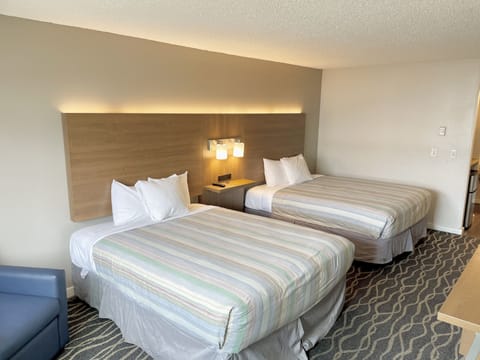 Standard Room, 2 Queen Beds | Desk, blackout drapes, iron/ironing board, free WiFi