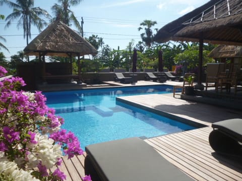 Outdoor pool, pool umbrellas, sun loungers