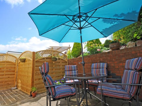 Outdoor seating area on the patio | Two Beaches, Paignton