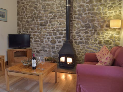 Living room with wood burner | Gwili Cottage - Upton Hall Cottages, Nantgaredig, near Llandeilo