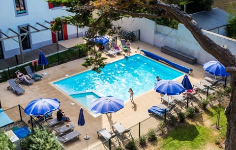 Dive into the lovely outdoor pool during the summer.