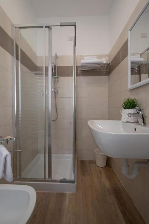 Shower, eco-friendly toiletries, hair dryer, bidet