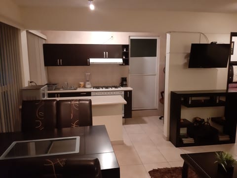 Family Apartment, 3 Bedrooms, Kitchen, City View | Private kitchen | Fridge, cookware/dishes/utensils