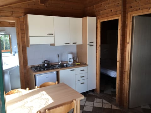 Family Chalet, Park View | Private kitchenette | Coffee/tea maker, highchair, cookware/dishes/utensils