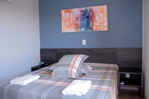 Executive Suite, 1 Queen Bed | Premium bedding, minibar, in-room safe, individually decorated