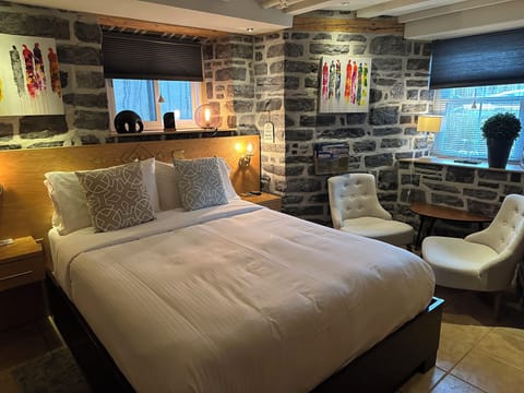 Superior Room with Stone Wall, Non Smoking | Premium bedding, down comforters, desk, blackout drapes