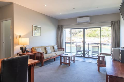 Premium Suite, 2 Bedrooms, River View | Living area | LCD TV