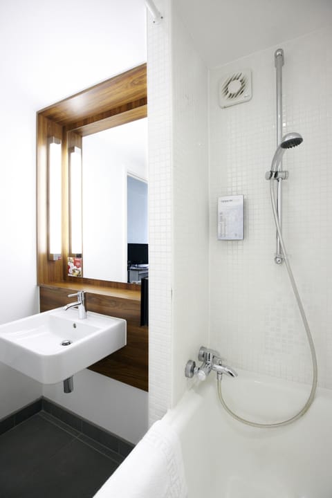 Combined shower/tub, eco-friendly toiletries, hair dryer, towels