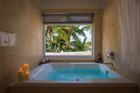 Jacuzzi Suite with Partial Ocean View | In-room safe, blackout drapes, iron/ironing board, free WiFi