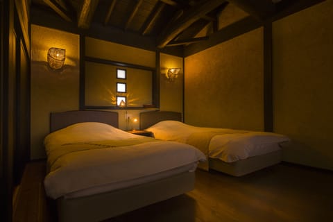 Japanese Western Style Room with Private Open-air Bath, Ocean View | Down comforters, minibar, in-room safe, free WiFi