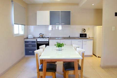 Suite (Quadruple) | Private kitchen | Fridge, microwave, toaster, cookware/dishes/utensils