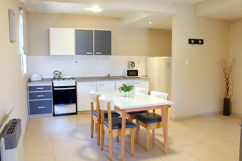 Suite (Quadruple) | Private kitchen | Fridge, microwave, toaster, cookware/dishes/utensils