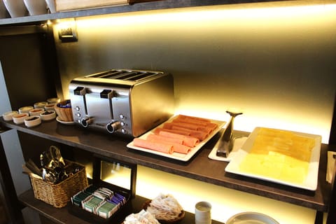 Daily buffet breakfast (USD 27 per person)