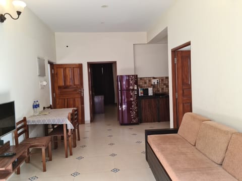 Two Bedroom Apartment with Pool View | Living area | Smart TV