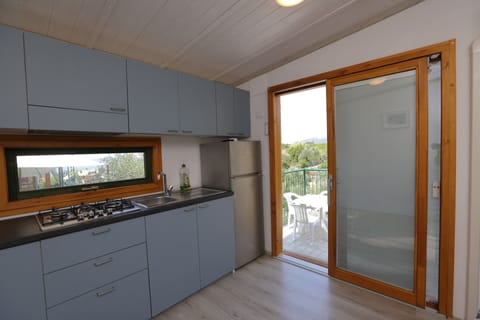 Panoramic Bungalow, Partial Sea View | Private kitchen | Fridge, stovetop, cookware/dishes/utensils, freezer