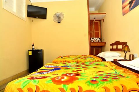 Family Quadruple Room, 2 Queen Beds, Non Smoking | 3 bedrooms, minibar, individually decorated, individually furnished
