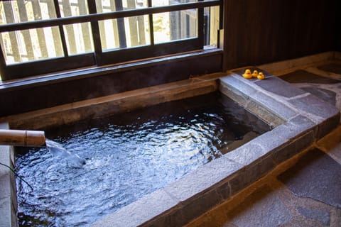 Japanese Style Room with Private Hot Spring | Bathroom | Separate tub and shower, spring water tub, free toiletries, hair dryer