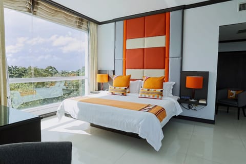 Suite, 1 King Bed | Down comforters, in-room safe, desk, blackout drapes
