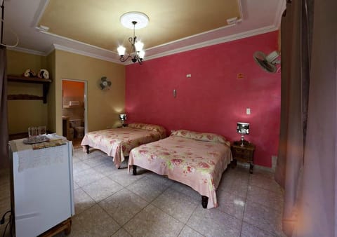 Family Quadruple Room, 2 Queen Beds, Courtyard View | In-room safe, blackout drapes, iron/ironing board, bed sheets