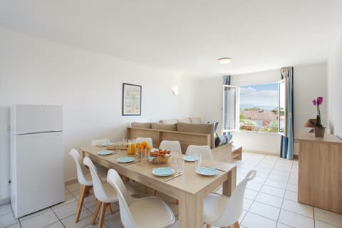 Reconnect with loved ones over a meal at the dining table.