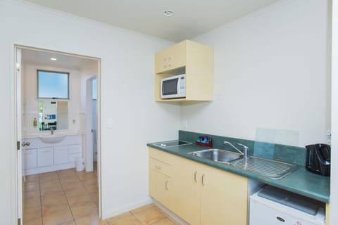 One Bedroom | Private kitchenette | Microwave, stovetop, electric kettle, toaster