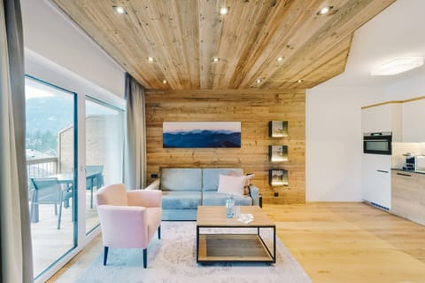 Superior Suite | Living area | Flat-screen TV