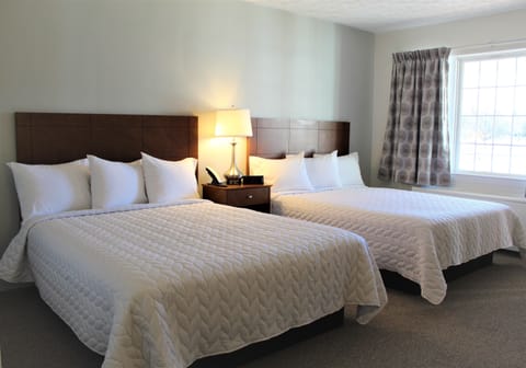 2 Queen Beds, Poolside | Blackout drapes, free WiFi, bed sheets