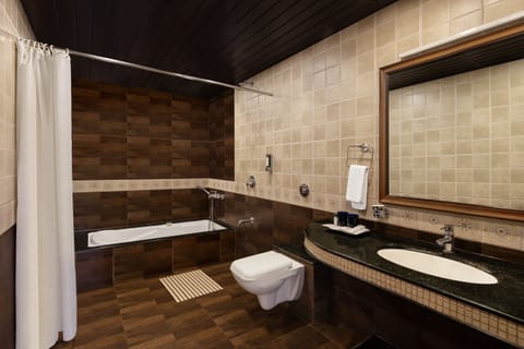 Suite, 1 King Bed, Garden View (Chalets) | Bathroom | Shower, free toiletries, hair dryer, bathrobes