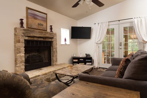 Family Cottage, Multiple Beds, Resort View | Living room | Smart TV, fireplace