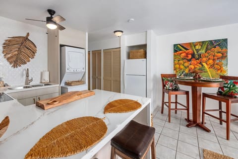 Condo, 1 King Bed (Kona Isle E23) | Private kitchen | Fridge, microwave, stovetop, dishwasher