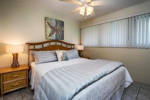 Condo, 1 King Bed (Kona Isle E23) | 1 bedroom, iron/ironing board, bed sheets