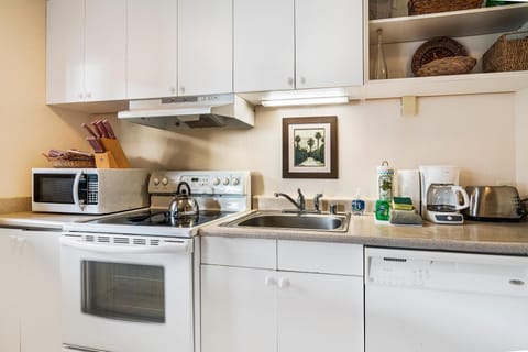 Condo, 1 Queen Bed (Kona Makai 2-102) | Private kitchen | Fridge, microwave, stovetop, dishwasher