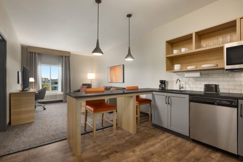 Suite, 1 Bedroom | Private kitchenette | Full-size fridge, microwave, stovetop, dishwasher