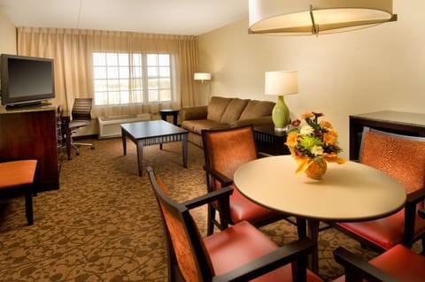 Suite, 1 King Bed, Non Smoking | Pillowtop beds, in-room safe, blackout drapes, iron/ironing board