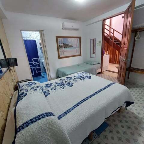 Double bed and 1 individual bed (Room 3) | In-room safe, blackout drapes, iron/ironing board, free WiFi