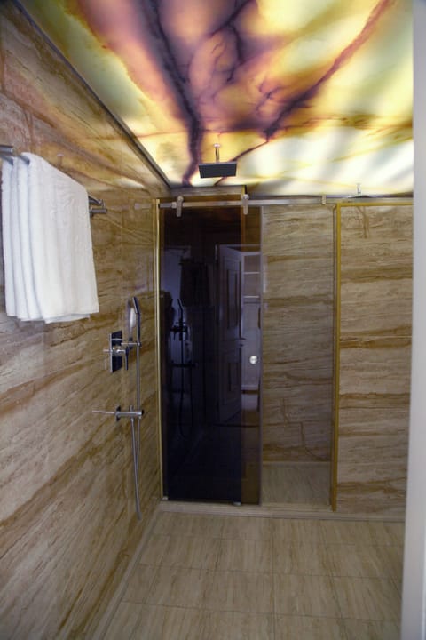 Family Triple Room | Bathroom | Shower, rainfall showerhead, hair dryer, bathrobes